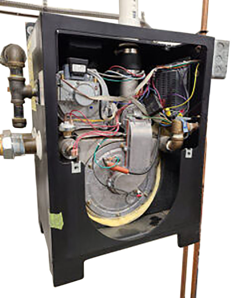 "Image of a wall-mounted Mod/Con boiler with exposed components, including wiring, pipes, and internal mechanisms for heating and controlling water flow."