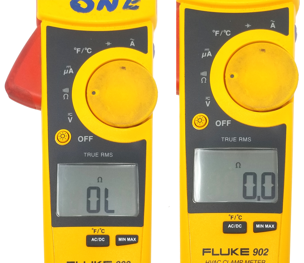 two digital multimeters, which are tools used for measuring electrical values such as voltage, current, and resistance. The multimeter on the left displays ‘OL’ on its screen, which typically indicates an overload or out-of-range measurement. The one on the right shows a reading of ‘0.0,’ suggesting it is ready to take a measurement or that it’s measuring a value with no significant digits. Both multimeters have a yellow body with red and black areas, rotary dials for selecting the type of measurement, and digital screens for displaying readings.